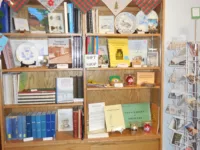 The gift shop contains new and used books plus postcards, toys, etc.